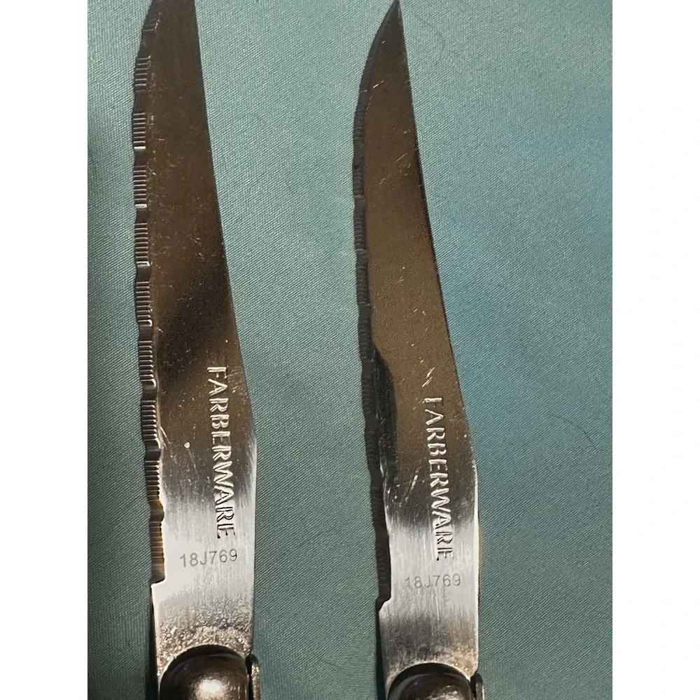 2Farberware 18H769 Fine Serrated Steak Knives,‎ W/ Black Scales